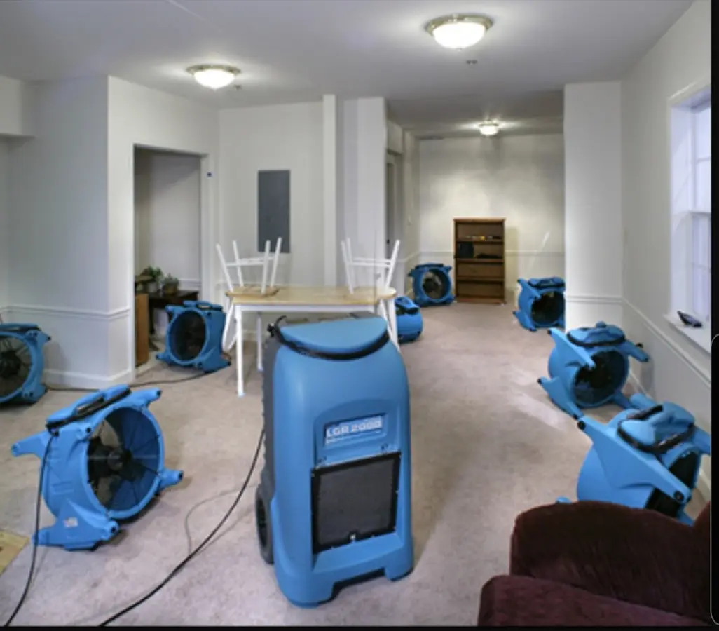 Air movers and dehumidifier setup for Water Damage Restoration in Woonsocket